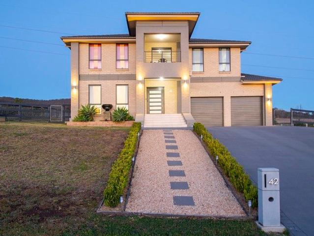 Expansive Two Storey Family Home with Multiple Living Zones & Premium Shed