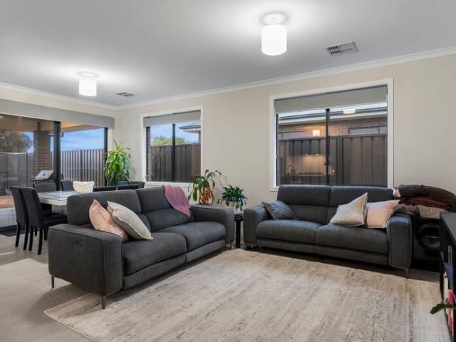 Experience contemporary family living at its finest in this beautifully presented home