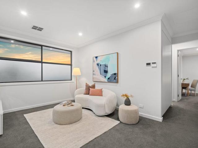Experience contemporary luxury in this beautifully designed family home