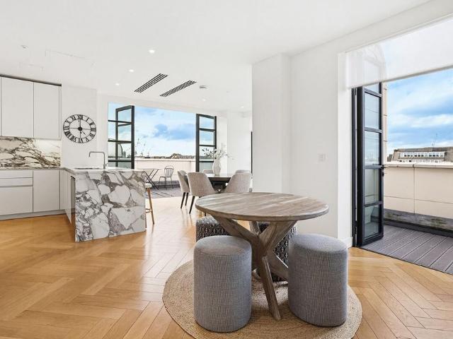 Experience contemporary luxury living in an impeccably elegant development