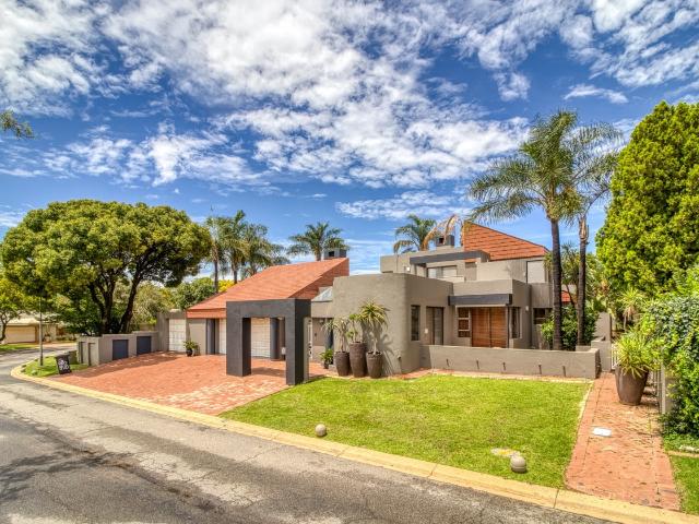 Experience elevated living in this 4/5 bedroom home with staff quarters, in Fourways Gardens