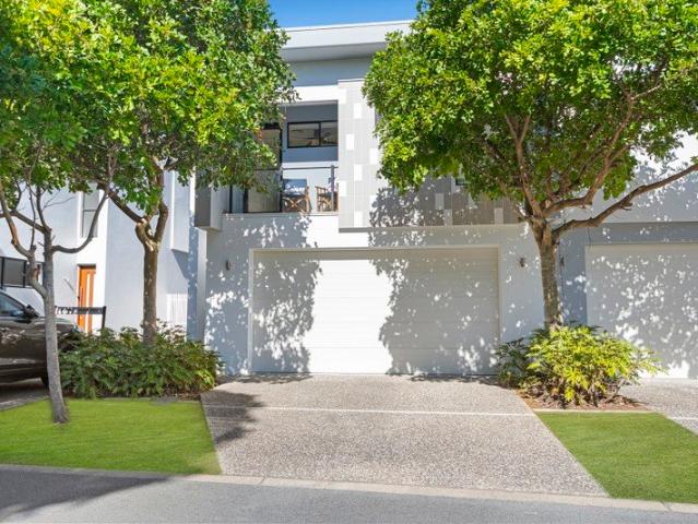 Experience Resort Style Living in One of the Gold Coast's Most Prestigious Gated Communities