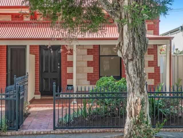 Experience the charm of historical living with modern comforts in this beautifully updated sandstone fronted cottage!