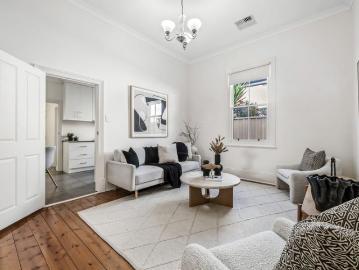 Experience the charm of historical living with modern comforts in this beautifully updated sandstone fronted cottage!