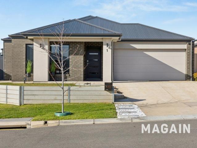 Experience versatile family living in a chic, modern oasis