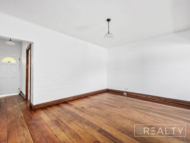 Explore the charm of this thoughtfully renovated miners cottage on the historic Flowers Drive