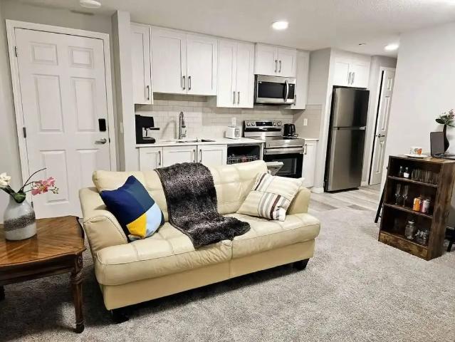Exquisite 2 Bedroom, 1 Bath Legal basement Suite with Separate Utility Meter — 2 Bedrooms Main Floor