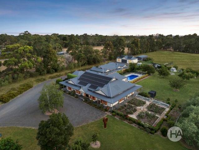 Exquisite Farmhouse Dual Living over 14.5 Acres