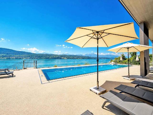 Exquisite Wörthersee Wohnung mit privatem Seezugang