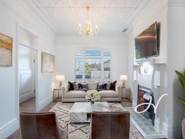 Exquisite Three Story Residence – Luxury Living Steps from Nobby's Beach and Coastal Precincts
