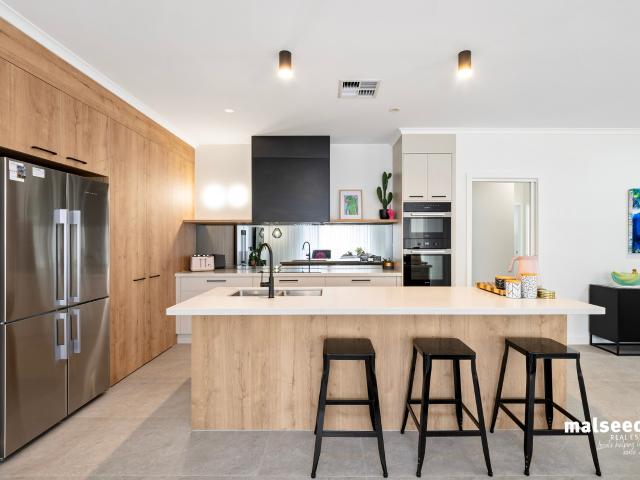 Exquisitely Designed Near New Family Home