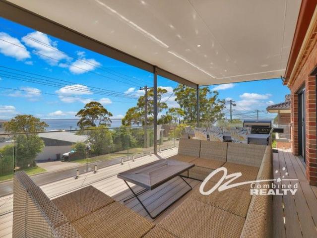 EXPANSIVE WATER VIEWS OVER THE PRISTINE WATERS OF JERVIS BAY NEWLY RENOVATED SOLD FULLY FURNISHED SUB DIVISION POTENTIAL HOLIDAY READY
