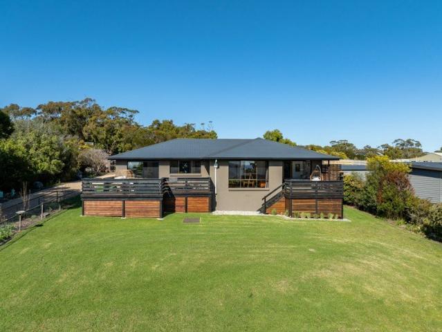 Extensively renovated home set on a secluded block, enjoying stunning ocean views