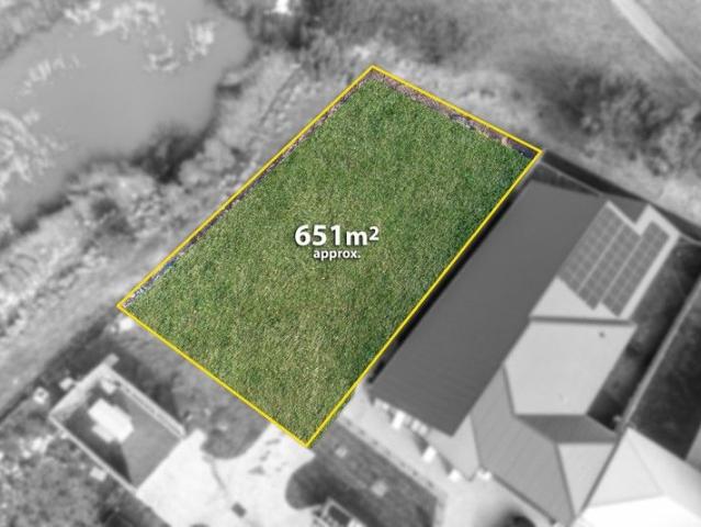 ENORMOUS CORNER BLOCK WITH GOLF COURSE VIEWS, TITLED AND READY TO BUILD