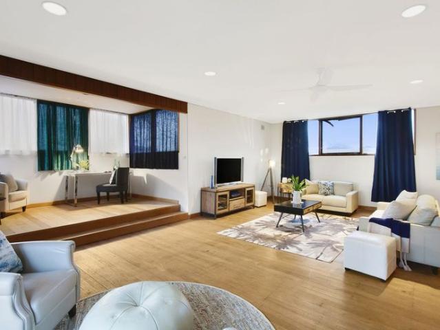 EXTRA SPACIOUS HOME WITH 2 LARGE LIVING AREAS AND CITY VIEWS