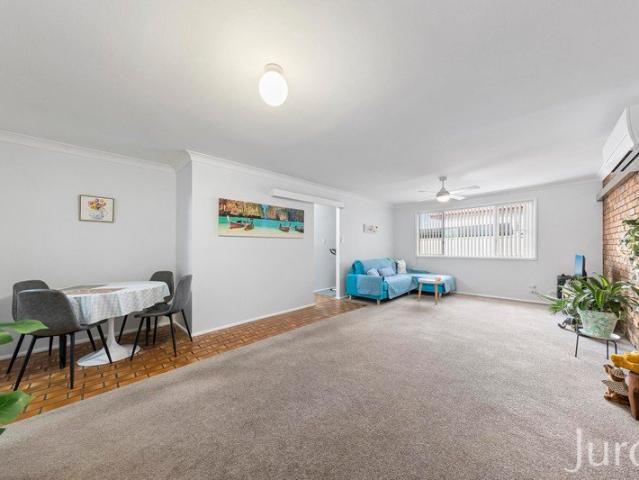 Extraordinarily Spacious Brick Unit in a Convenient Location!