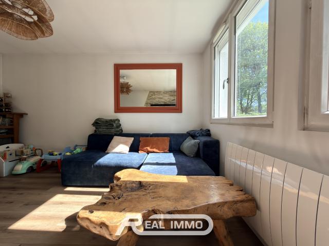 F2 AVEC GARAGE ET CAVE