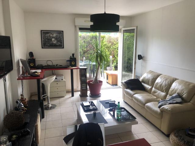 F2 avec jardin et parking