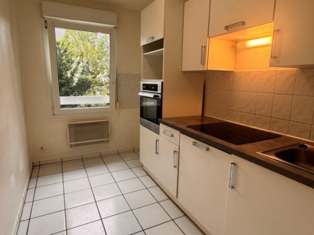 F2 Robertsau – cuisine équipée balcon – garage ITA Immobilier | Agence immobilière à Strasbourg Haguenau Brumath