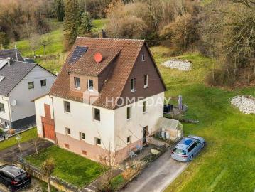 Familien aufgepasst! Gemütliches Einfamilienhaus mit schönem Grundstück in ruhiger Ortsrandlage