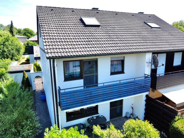 Angenehm wohnen mit Garten und Garage.
