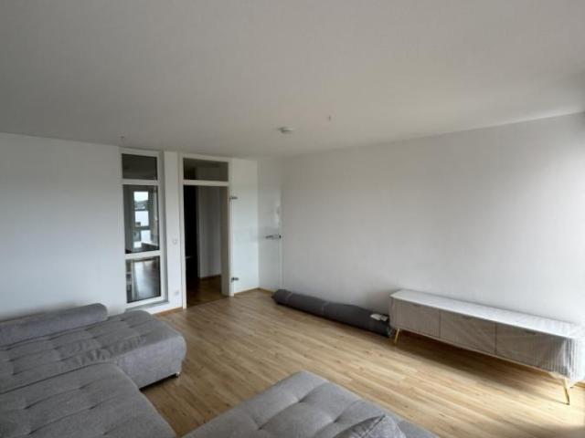 Familienfreundliche 3,5 Zimmer Wohnung mit West Loggia, EBK & Tiefgaragenstellplatz
