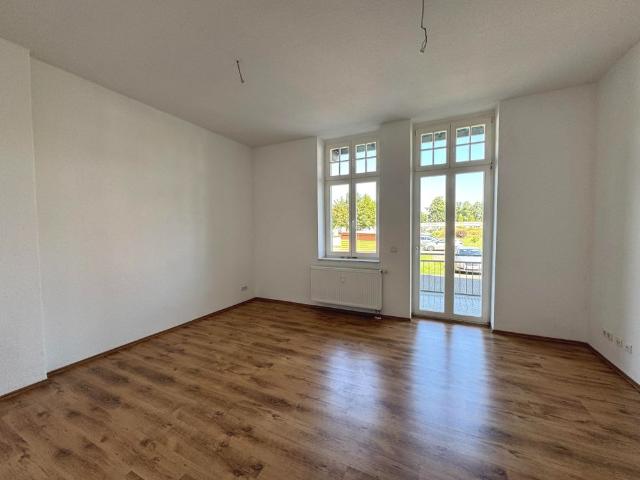 Familienfreundliche 4 Zimmer Wohnung im Erdgeschoss mit Balkon