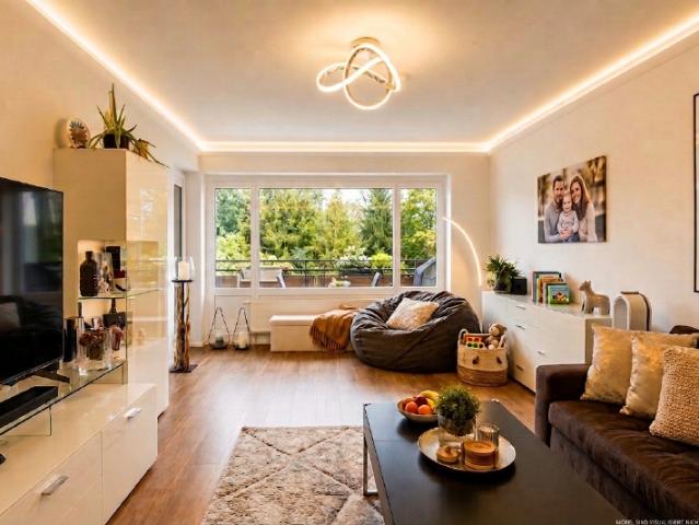 Familienfreundliche 4 Zimmer Wohnung mit großem Gemeinschaftsgarten