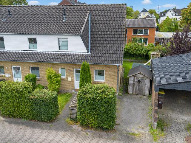 Familienfreundliches Reihenendhaus mit Garten und Fußbodenheizung in zentraler Lage