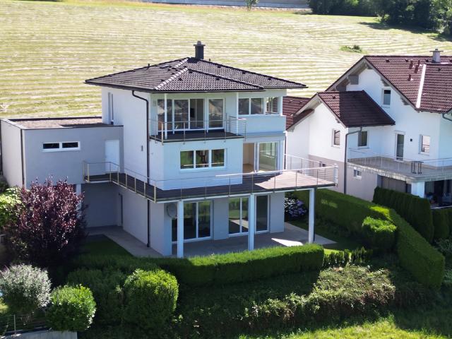 Familienglück mit Panoramablick! Architektenhaus in Mondseer Bestlage