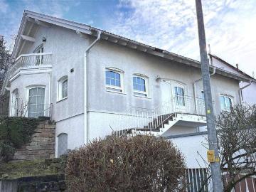 Familienglück in Bestlage: Einfamilienhaus mit traumhaftem Garten und Einliegerwohnung