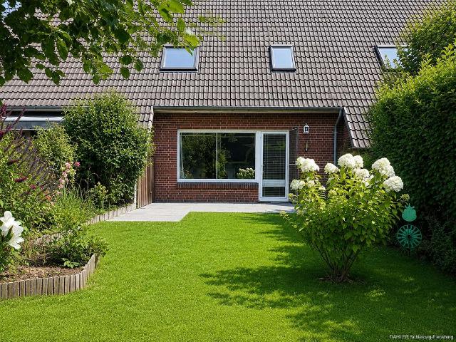 Familienglück in Flensburg – Gepflegtes Mittelreihenhaus mit Garten und Garage