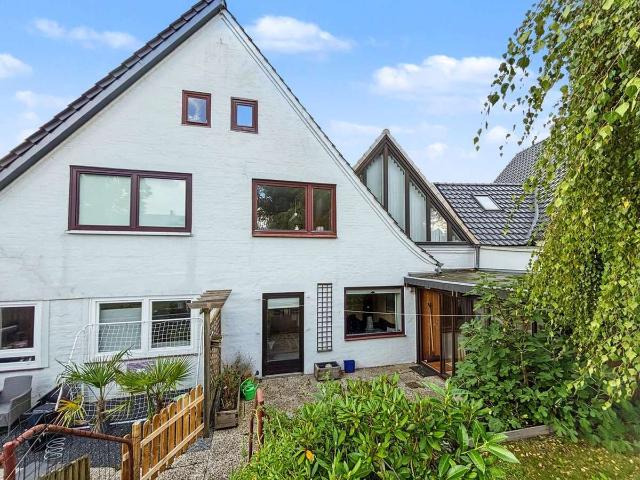 Familienglück in ruhiger Bestlage: Doppelhaushälfte mit Terrasse und schönem Garten in Flensburg