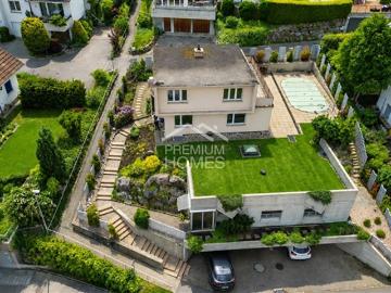 Familienhaus mit Einliegerwohnung Potenzial an bester Lage