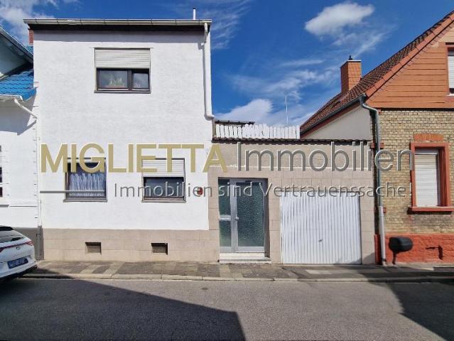 Familienhaus mit Garten und Garage