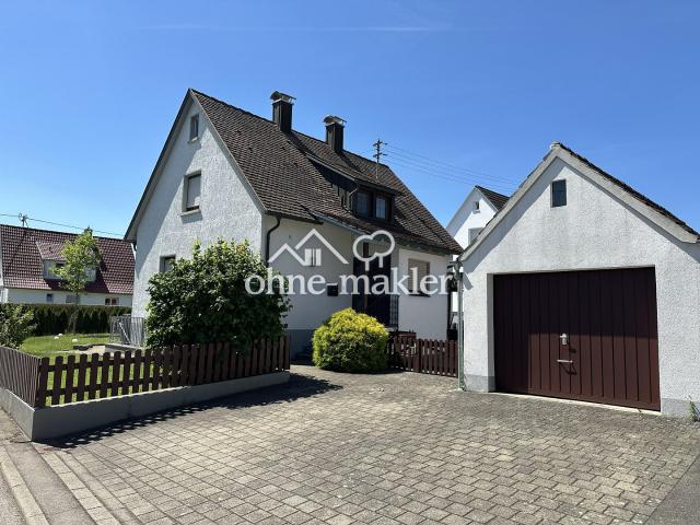 Familienhaus mit Traumgarten, neuer Heiztechnik, großer Garage & Ausbaupotenzial in ruhiger Lage