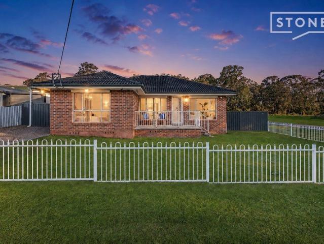 Family comfort with great garage/workshop