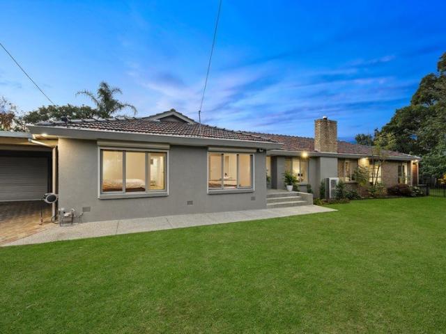Family Flexibility on a Quarter Acre of Tranquil Parkside Living