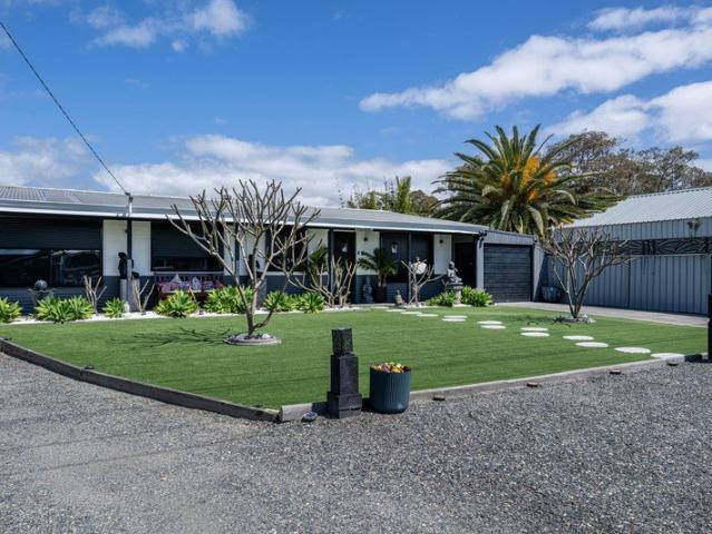 Family Home Up Front, Ultimate Tradie Zone Out Back