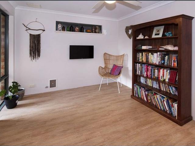 Family Home with Multiple Living Areas and Large Backyard!