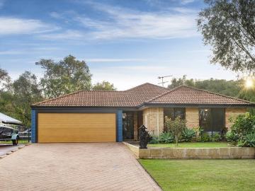Family Home with Multiple Living Areas and Large Backyard!