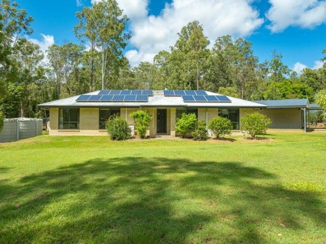Family home with a pool on 1.3 acres
