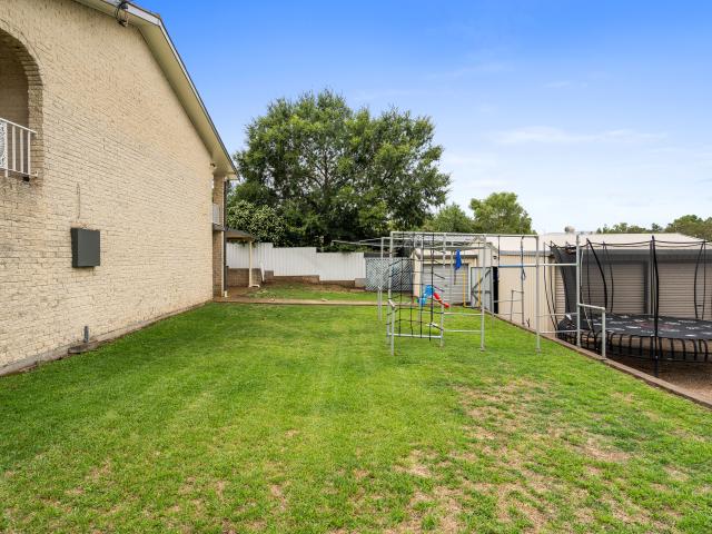 Family Home with Abundant Shed and Garage Space