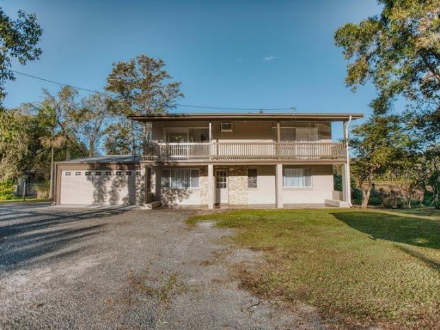 Family Home with Fenced Yard & Large Garage!