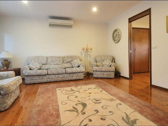 Family home with large Detached Garage & Extra Storage Room