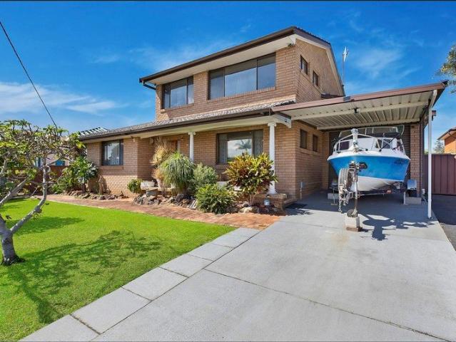 Offers closing by 4pm on 4th of July Family home with panorama lake water view