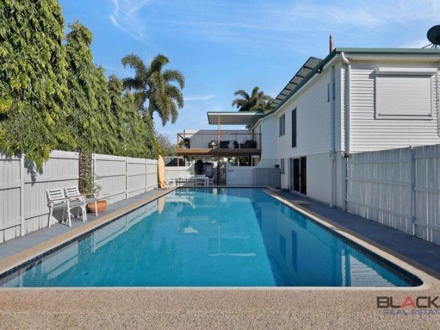 Family Home with Pool Footsteps from the Beach