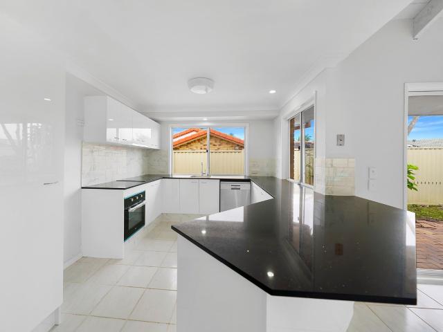 Family home with pool in Robina