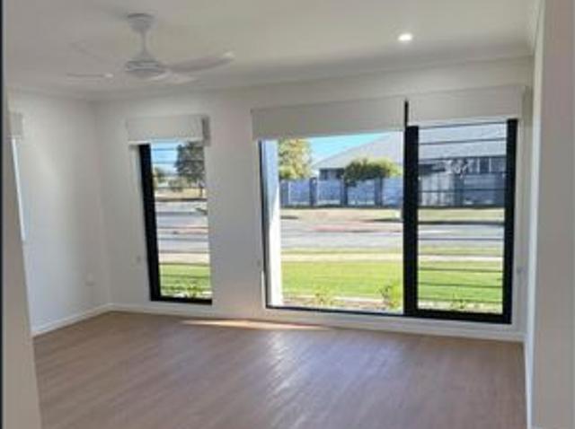 Family Home with Side Access & Multiple Living Areas
