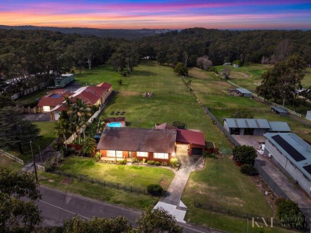 Family Home and Pool on Acreage in Prime Location